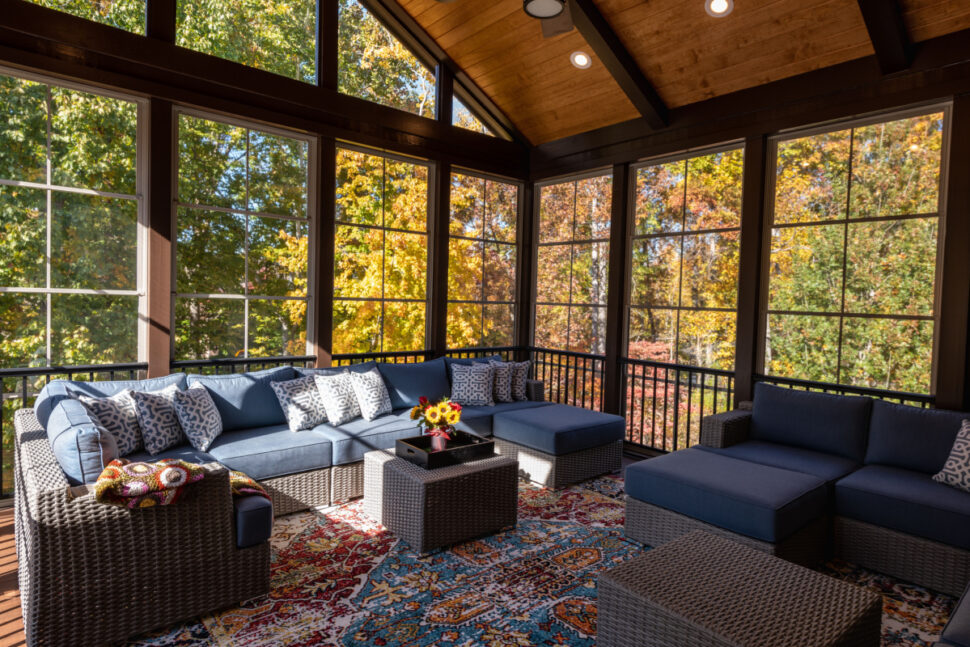 Cozy screened porch with contemporary furniture